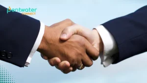 A close-up shot of two business partners shaking hands, emphasizing trust and partnership when hiring the best digital marketing agencies for business success in 2025.