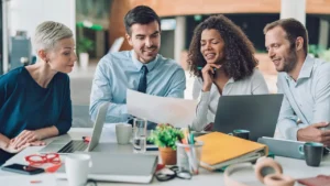 A business meeting with people discussing a plan "What Is the Best SEO Outsourcing Solution? Insights on hiring the perfect SEO company to boost your business success in 2025.