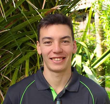 Black silhouette icon of a woman with medium-length hair wearing a suit and tie on transparent background.